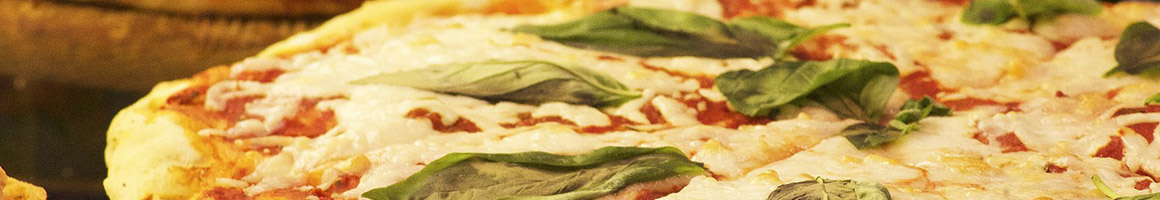 Eating Pizza at ﻿Capri Pizza & Pasta ​ restaurant in Ossining, NY.